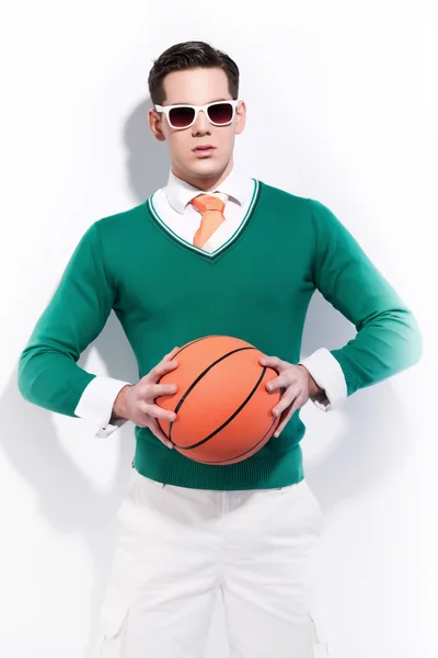 Retro basketball fashion man wearing white sunglasses a green sw — Stock Photo, Image