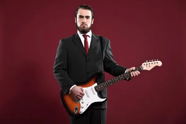 Retro fashion music man with beard wearing grey suit and red tie — Stock Photo, Image