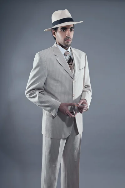 Mafia fashion man wearing white striped suit and hat. Holding vi — Stock Photo, Image