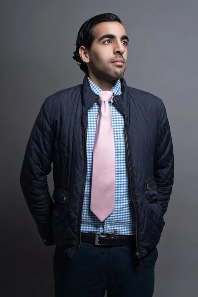 Contemporary fashion man wearing blue jacket and pink tie. Black — Stock Photo, Image