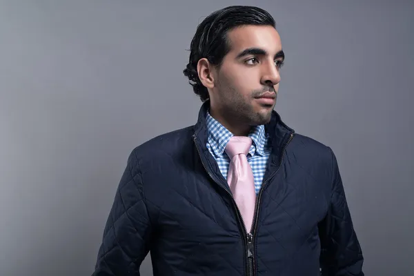 Contemporary fashion man wearing blue jacket and pink tie. Black — Stock Photo, Image