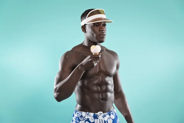 Summer black african american muscled fitness man holding ice cr — Stock Photo, Image