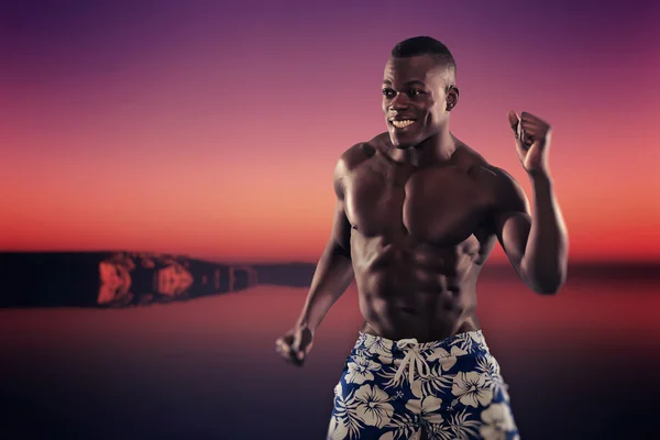 Summer black african american muscled fitness man dancing. Weari — Stock Photo, Image