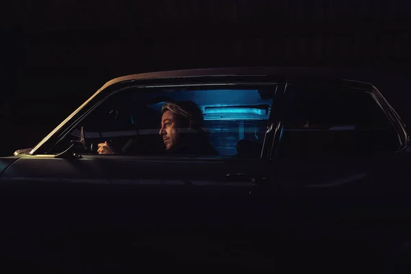 Man Blond Hair Sits American Classic Muscle Car Night — Stock Photo, Image