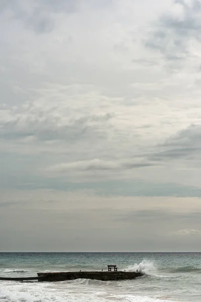 Pier Bench Splashes Wave Ocean Cloudy Sky — Stock Photo, Image