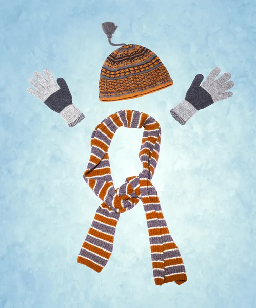 Winter clothing on snow background — Stock Photo, Image