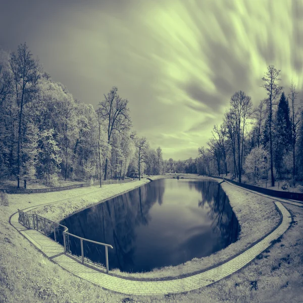 Infrared landscape to the lake and park — Stock Photo, Image