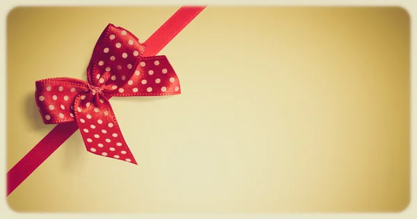 Retro greeting card. Shiny ribbon on vintage background and stylized instagram — Stock Photo, Image