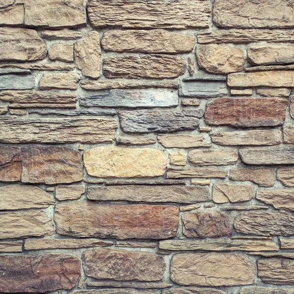 Kamienny mur. płaskie skumulowanych tło i tekstura. — Zdjęcie stockowe