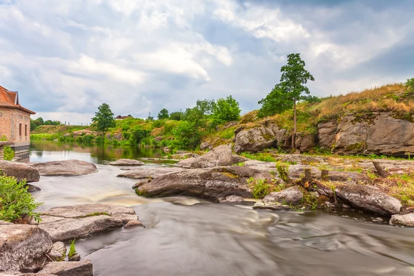 Rapid river in summer landscape — Stock Photo, Image