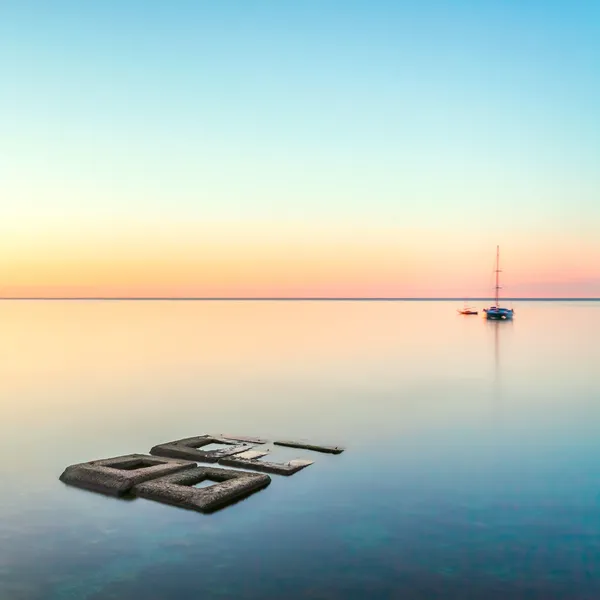 Minimalist seascape with rocks & ship — Stock Photo, Image