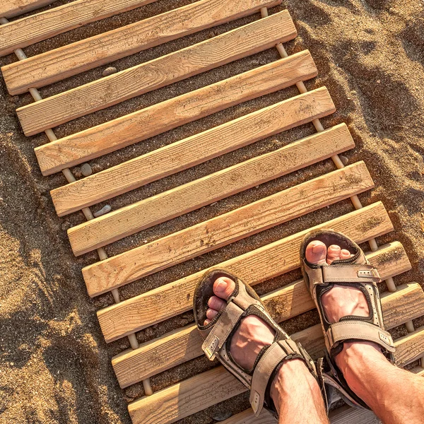 Man feet on beach sand — Stock Photo, Image