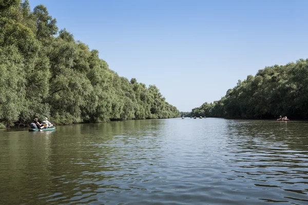 Donau-Delta, Touristen im Boot, Rumänien Stockbild
