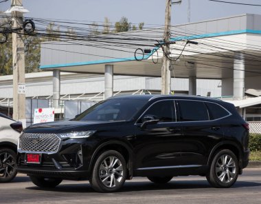 Chiangmai, Thailand - December 23 2021: Private suv car, havel h6. Photo at road no.1001 about 8 km from downtown Chiangmai, thailand.