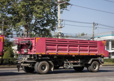 Chiangmai, Thailand - December 22 2021:  Trailer Dump truck of Thanachai Company. On road no.1001, 8 km from Chiangmai city.