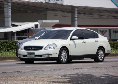 Chiangmai, Thailand - April  21 2022:  Private car, Nissan Teana. On road no.1001, North of city about 8 km from Chiangmai Center.