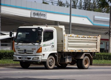 Chiangmai, Thailand -  June  13 2022: Private Hino Dump Truck. On road no.1001 8 km from Chiangmai Business Area.