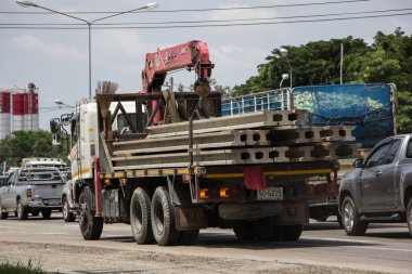 Chiangmai, Thailand -  June  13 2022: Private Hino Crane Truck. On road no.1001 8 km from Chiangmai Business Area.