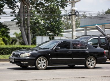 Chiangmai, Thailand -  June  13 2022:  Private car, Nissan Cefero. On road no.1001, North of city about 8 km from Chiangmai Center.