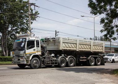 Chiangmai, Thailand -  June  13 2022: Private Isuzu Dump Truck. On road no.1001 8 km from Chiangmai Business Area.