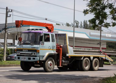 Chiangmai, Thailand -  June  13 2022: Private Isuzu Crane Truck. On road no.1001 8 km from Chiangmai Business Area.