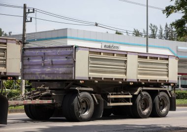 Chiangmai, Thailand -  June  13 2022: Private Isuzu Dump Truck. On road no.1001 8 km from Chiangmai Business Area.