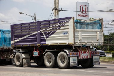 Chiangmai, Thailand -  June  13 2022: Private Isuzu Dump Truck. On road no.1001 8 km from Chiangmai Business Area.
