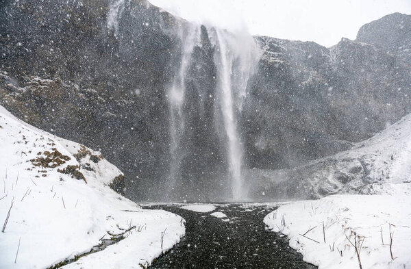 Icelandic waterfall Seljalandsfoss durind winter time