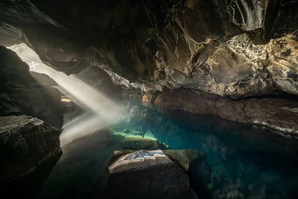 Grjotagja volcanic cave with an incredibly blue and hot thermal water near lake Myvatn. The geothermal grotto and cave, areas of Iceland featured in Game of Thrones. — Stock Photo, Image