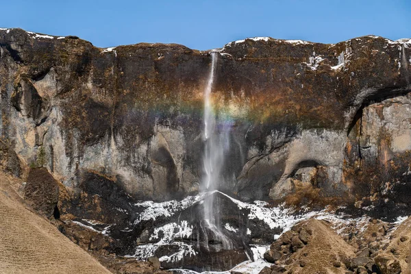 Fénykép egy jégesésről Izlandon szivárvánnyal — Stock Fotó
