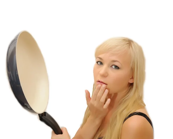 Young beautiful woman with a frying pan isolated on white background. Waiti — Stock Photo, Image