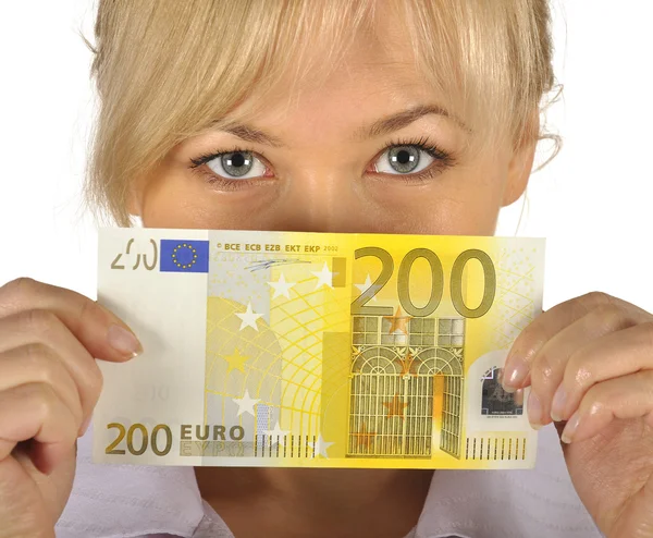 Jonge vrouw aanhouden van euro geld op een witte achtergrond — Stockfoto