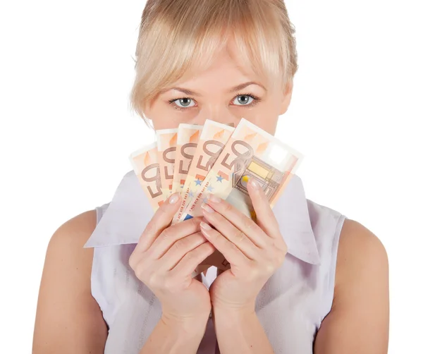 Young woman holding euro money on a white background — Stock Photo, Image