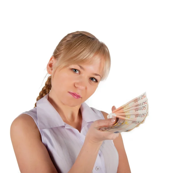 Young woman holding euro money on a white background Royalty Free Stock Images