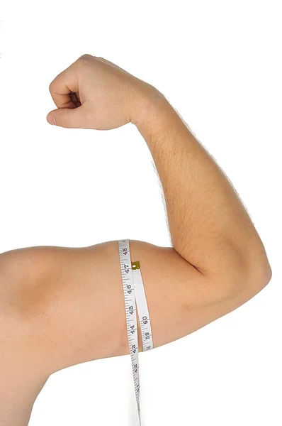 Man arm med måttband runt biceps över vit bakgrund — Stockfoto