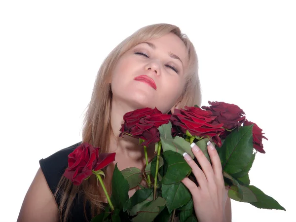 Young woman holding a bunch of red roses - isolated on white background — Stock Photo, Image