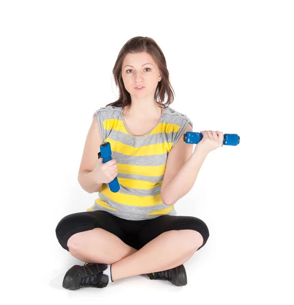 Jonge vrouw doen fitness oefeningen geïsoleerd op witte achtergrond — Stockfoto