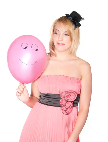 Portrait of a womanl in pink dress with smiling air ball — Stock Photo, Image