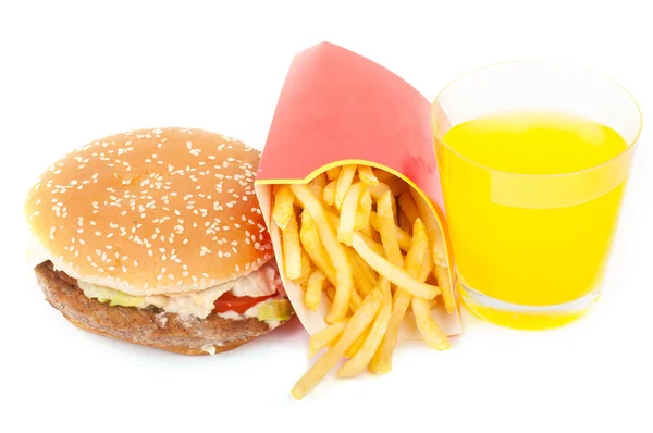 Ensemble petit déjeuner : jus d'orange, hamburger et frites isolées sur fond blanc . — Photo