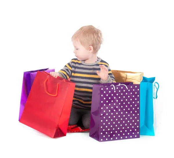 Attractive boy with shopping bags — Stock Photo, Image