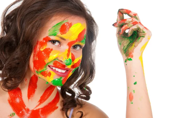 Happy young woman painting Easter eggs — Stock Photo, Image