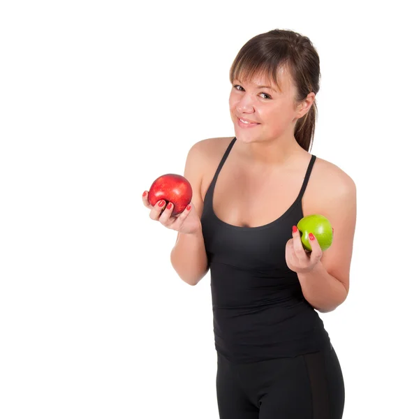 Mooie jonge sport vrouw met rode en groene appel, geïsoleerd op wit — Stockfoto