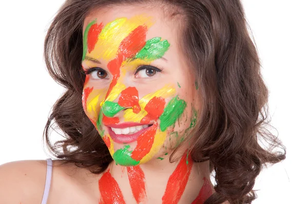 Happy young woman painting Easter eggs — Stock Photo, Image