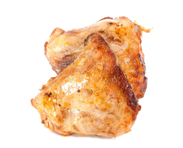 Ψητά μπούτια κοτόπουλου απομονωμένα σε λευκό φόντο — Φωτογραφία Αρχείου