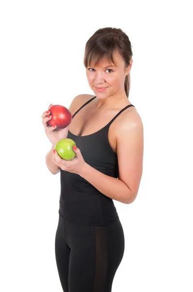 Hermosa mujer deportiva joven con manzana roja y verde, aislada en blanco — Foto de Stock