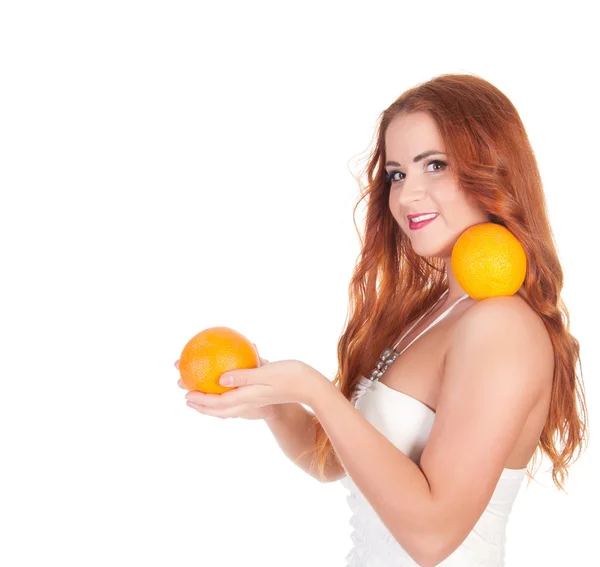 Beautuful woman with red long hair posing in white dress — Stock Photo, Image