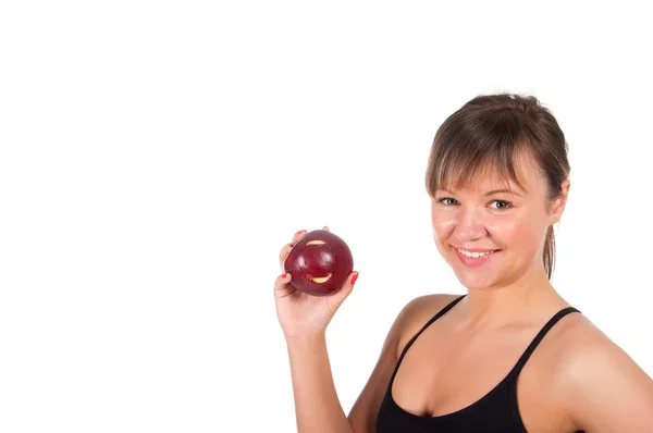 Hermosa joven deportista con manzana roja, aislado en blanco — Foto de Stock