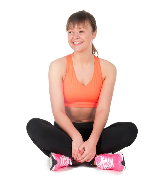 Jovem mulher fazendo exercícios de fitness — Fotografia de Stock