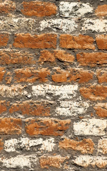 Textura de una vieja pared de ladrillo blanco en ruinas —  Fotos de Stock