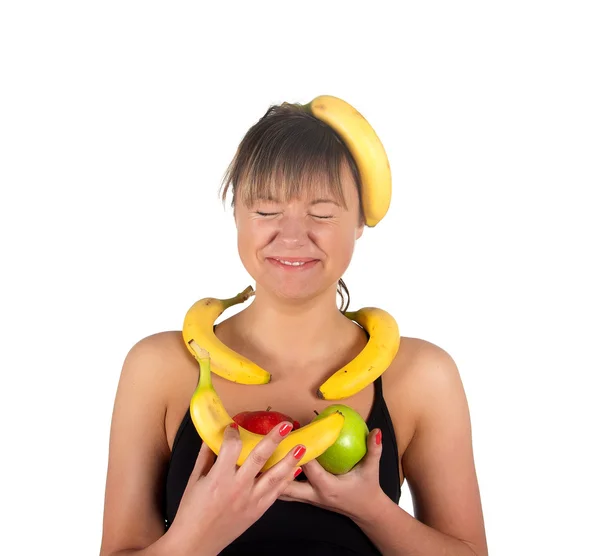 Beautiful fitness young woman with bananas and apples. — Stock Fotó